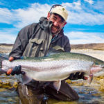 rainbow trout fishing at jurassic lake in argentina