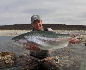 An insanely huge rainbow trout from Jurassic lake in Argentina