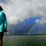A rainbow over the Bahama water