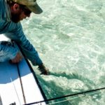 Releasing a bonefish from the boat