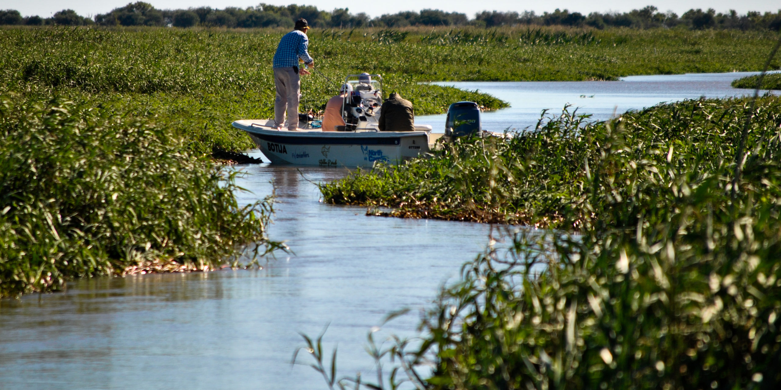 Anglers fish for Golden Dorado on the Paraná River system in Argentina.
